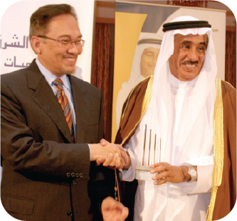 Award presentation handshake with dignitary